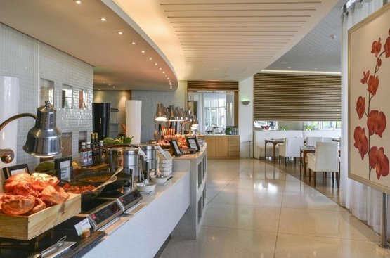 ОАЕ Raffles Dubai